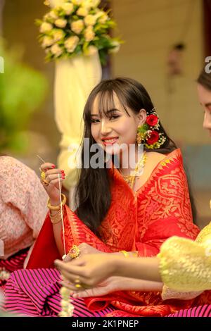 A portrait of a beautiful Indian bride on her wedding day morning Stock Photo