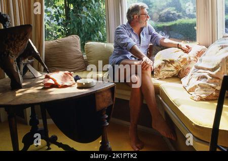 Playwright John Osborne at home in 1983 Stock Photo