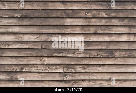 Rustic wood cladding texture, horizontal unpainted old wood planks background Stock Photo
