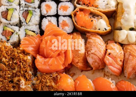 Assorted sushi nigiri and maki set. A variety of Japanese sushi with tuna, crab, salmon and rolls. Stock Photo