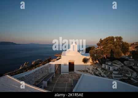 View of the beautiful and whitewashed Paleokastro Monastery and the Aegean Sea in the background Stock Photo