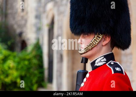 WINDSOR, ENGLAND, 15 SEPTEMBER 2012. Scots Guards Guardsman soldier on sentry duty outside Windsor Castle, Berkshire, United Kingdom Stock Photo