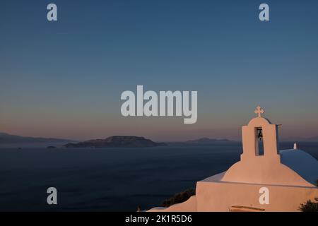 View of the beautiful and whitewashed Paleokastro Monastery and the Aegean Sea in the background Stock Photo