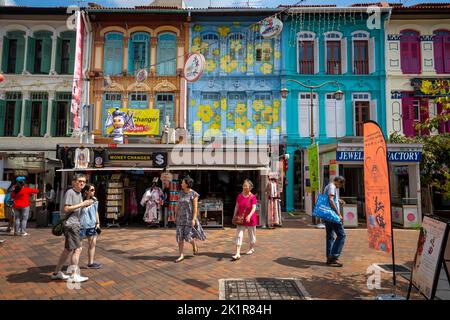 Locals and tourists shopping at street stalls on Pagoda Street, Chinatown Singapore Stock Photo