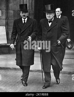 Winston Churchill and Clement Attlee leaving Westminster Abbey at the funeral of Lord Gort.  April 1946 Stock Photo
