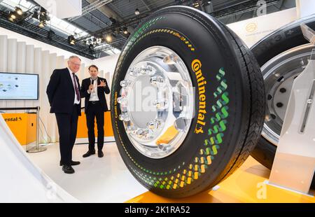 Hanover, Germany. 20th Sep, 2022. Nikolai Setzer (r), member of the Executive Board of Continental AG, shows Stephan Weil (SPD), Minister President of Lower Saxony, sustainable tire solutions for commercial vehicles at Continental's stand at the International Motor Show IAA Transportation for Commercial Vehicles at the Hanover Trade Fair Center. Credit: Julian Stratenschulte/dpa/Alamy Live News Stock Photo