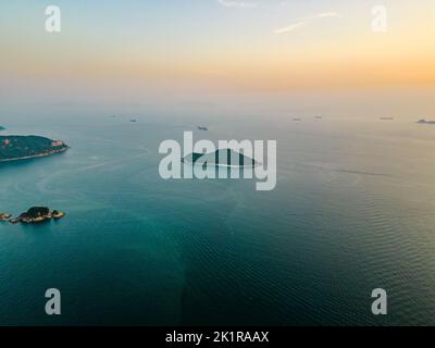 A scenic view of the blue ocean at the sunset in Repulse Bay, Hong Kong, South East Asia Stock Photo