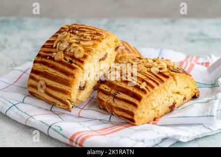 İstanbul cookies. Cookies with hazelnuts and raisins on a gray background. close up Stock Photo