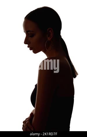 sad woman profile silhouette on black background looking down Stock Photo -  Alamy