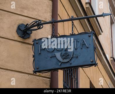 Lublin, Poland - June 05, 2022: Signboard with sign of Post (Polish: Poczta). The post office in old town Lublin Stock Photo