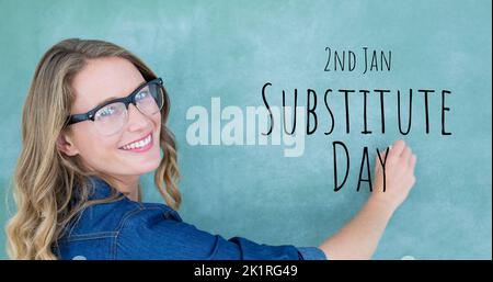 Composite of 2nd jan, substitute day text with portrait of caucasian female teacher writing on board Stock Photo