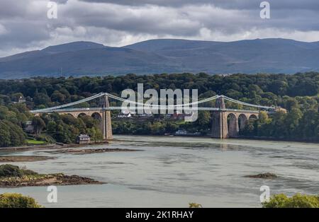 The Menai Bridge from North Wales Coastline across to Ynys Mon or Anglesey Stock Photo
