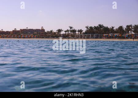 Relaxing and Sandy Coastline of the Red Sea Beach in Marsa Alam city, Egypt Stock Photo