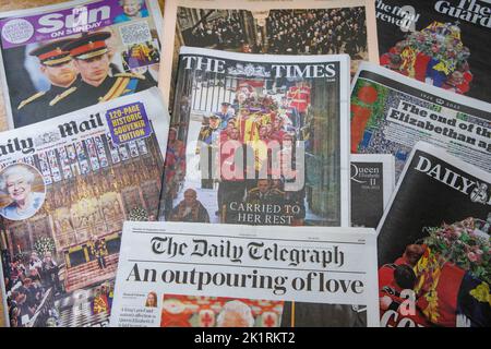 London, UK. 20th Sep, 2022. Front pages of the newspapers in Britain on 20th September following the death and the funeral of Her Majesty Queen Elizabeth II. The coffin of Queen Elizabeth was taken from Westminster Abbey after the service to Wellington Arch where it was transferred to a hearse. It then travelled to Windsor to a service in St George's Chapel. She was laid to rest next to her husband Prince Philip. Credit: Karl Black/Alamy Live News Stock Photo