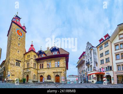 LUCERNE, SWITZERLAND - MARCH 30, 2022: Panoramic view on Kornmarkt square and medieval Town Hall, on March 30 in Lucerne, Switzerland Stock Photo