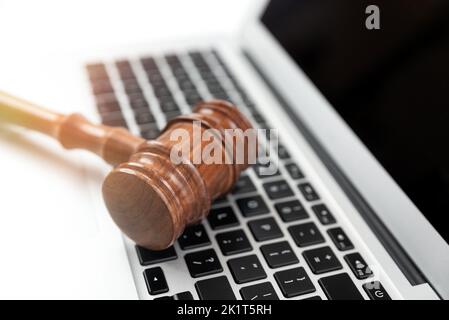 Cybercrime concept with gavel on laptop. Law and justice. Stock Photo