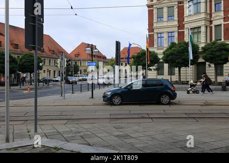 Cars drive out of a one-way street in Görlitz Stock Photo
