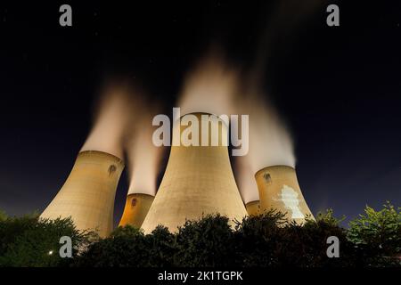 An outline of HRH Queen Elizabeth's head was projected onto one of the cooling towers of Drax Power Station to pay tribute after her death. Stock Photo