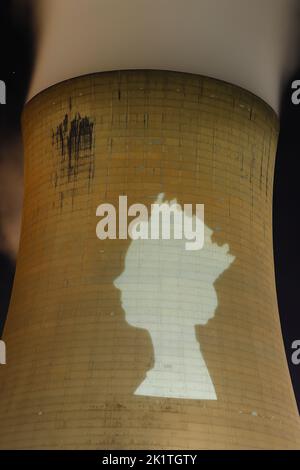 An outline of HRH Queen Elizabeth's head was projected onto one of the cooling towers of Drax Power Station to pay tribute after her death. Stock Photo