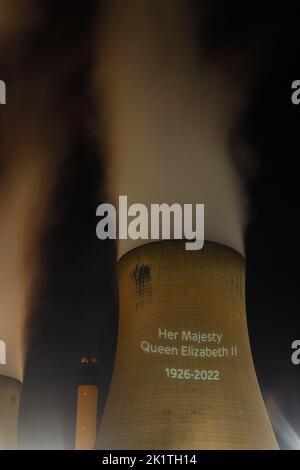 An outline of HRH Queen Elizabeth's head was projected onto one of the cooling towers of Drax Power Station to pay tribute after her death. Stock Photo