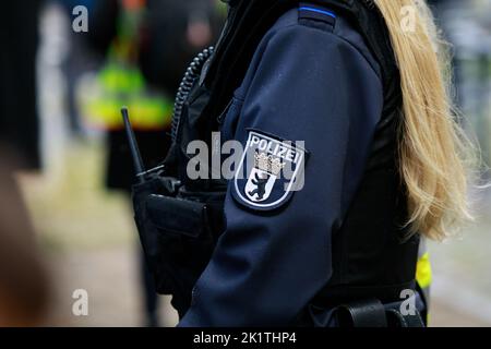 Berlin/Germany - September 18, 2022: German Polizei Berlin patch on a jacket from a police officer. Stock Photo