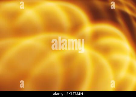 abstract orange wavy ligt pattern or background Stock Photo
