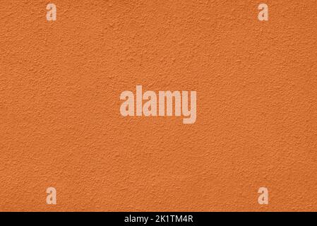 amberglow rough plaster wall texture Stock Photo