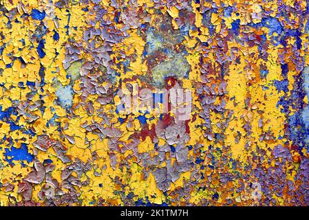 multicolour psychedelic abstract background. flakes of paint on concrete wall Stock Photo