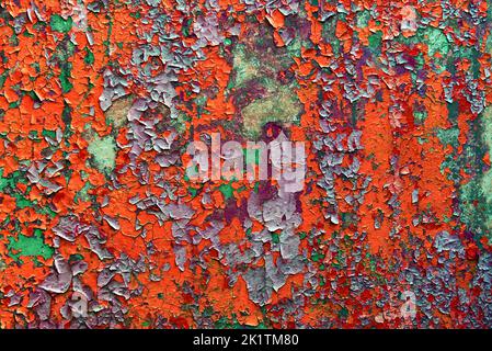 multicolour psychedelic abstract background. flakes of paint on concrete wall Stock Photo