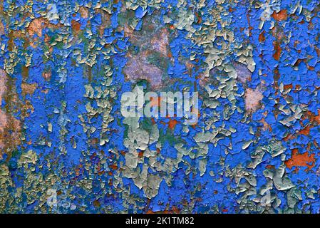 multicolour psychedelic abstract background. flakes of paint on concrete wall Stock Photo