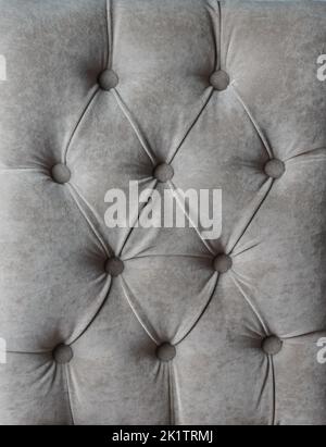 Gray capitone checkered soft fabric textile coach velours decoration with buttons Stock Photo