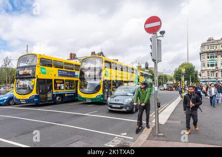 Dublin buses wait at traffic lights in Dublin City Centre, Ireland. Stock Photo