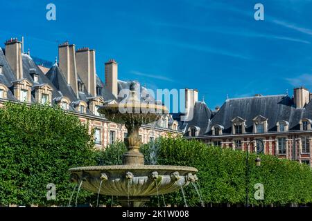 The Place des Vosges, originally Place Royale, is the oldest planned square in Paris and one of the finest in the city. Stock Photo