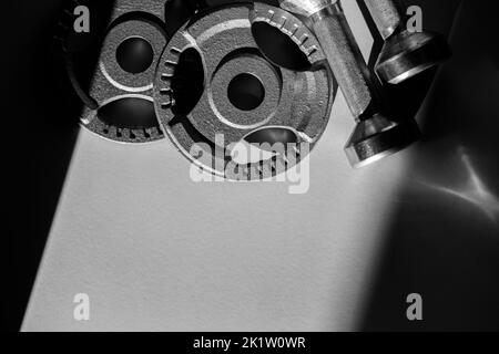 iClose up of dumbbells on grey backgound. Sport and fitness equipment. Horizontal sport poster, greeting cards, headers, website. Stock Photo