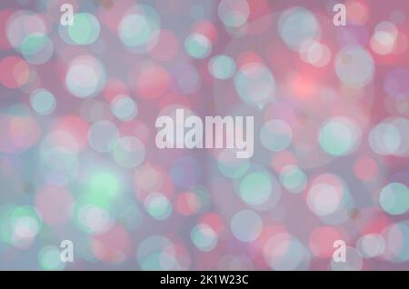 Pastel jewel tone background of bokeh light spots in beautiful colors of shades of blue, green, pink, purple and more. Abstract background stock photo Stock Photo
