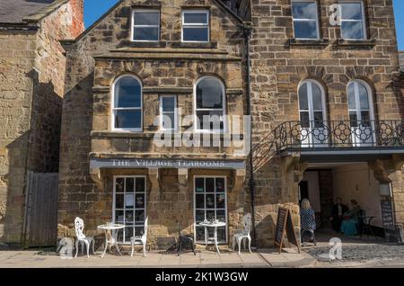 Small local business built from local stone along Northumberland Street at Alnmouth. A village on the Northumberland coast. Stock Photo