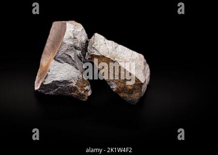 steel ore, produced from iron ore, isolated black background Stock Photo