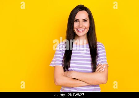 Closeup photo of young attractive lady recommend confident smiling new product isolated on yellow color background Stock Photo