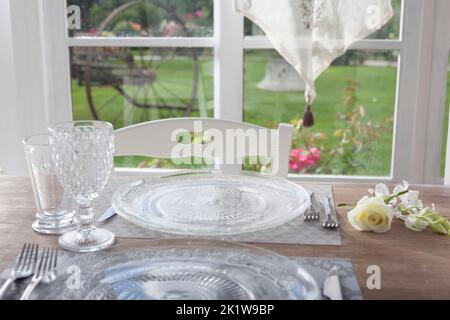 lunch set table in a bay window Stock Photo