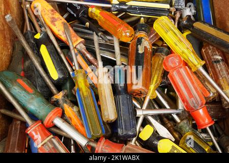 Closeup of a collection of used screwdrivers Stock Photo