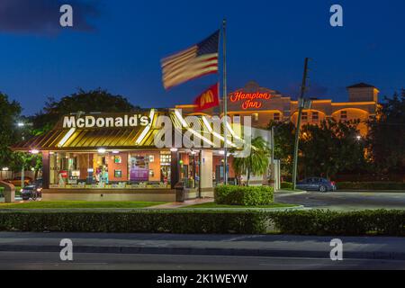 A McDonald's fast food restaurant at night in Fort Lauderdale, Florida, USA. Stock Photo