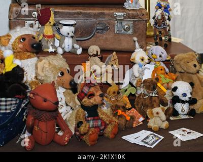 Soft handcrafted stuffed animals toys from archetypal suitcase Stock Photo