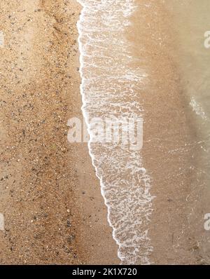 ocean wave reaching the coastline. Summer holiday vacation concept Stock Photo