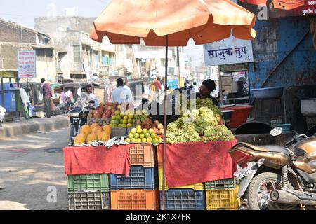 Indian fruit and vegetable vendors sell their products to locals in local markets set up in India Stock Photo