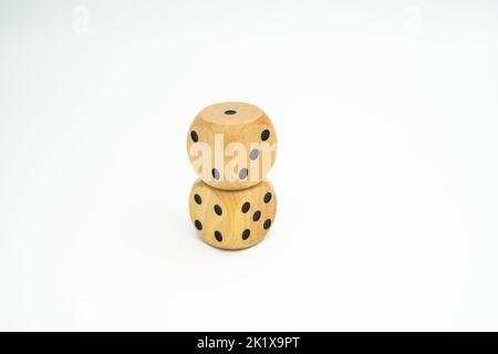 Two dice on top of each other with the numbers one, two, three, four and five visible Stock Photo