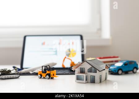 set of toy transport, house and a tablet Stock Photo