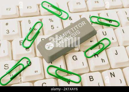 Hand writing sign Competitor AnalysisDetermine the Strength Weakness of Competitive Market. Business showcase Determine the Strength Weakness of Stock Photo