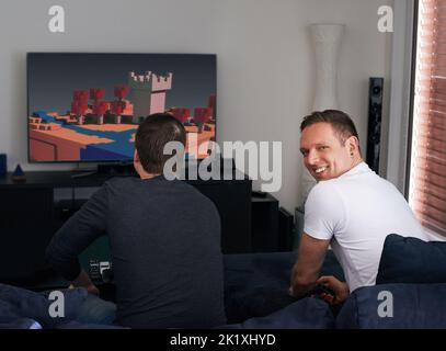 Things are always better when were together. an affectionate gay couple. Stock Photo