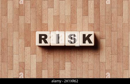 RISK wooden word block cubes with a laminate background. Production and manufacturing concept. 3D illustration rendering Stock Photo