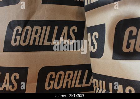 London, UK - September 12, 2022: Paper bags from the on-demand grocery delivery company Gorillas which claims to deliver groceries in 10 minutes Stock Photo